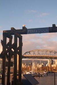Granville island View of boats and downtown - Tazim Damji